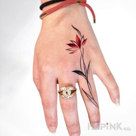 Tattoo Tulip on the fingers style: graphic / illustrative