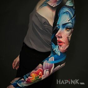 Tattoo Blue on the Attack on the shoulder motif: faces style: realistic
