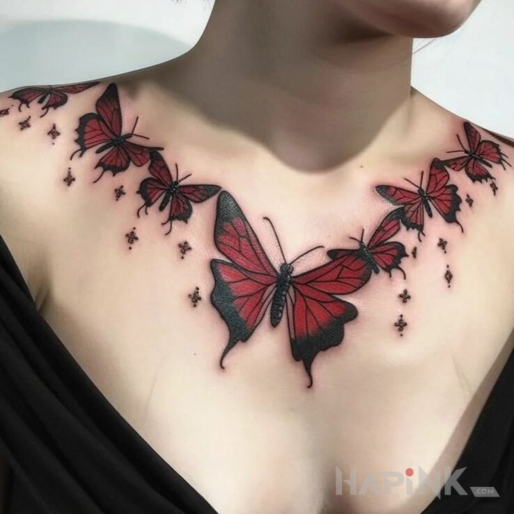 Tattoo Dekolt w motyle in colorful motif and graphic / illustrative style on the chest
