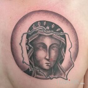 Tattoo Mother of God on the chest motif: patriotic