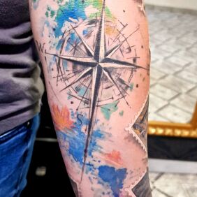 Tattoo Compass on the forearm motif: colorful style: Watercolor