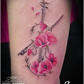 Tattoo Violin, flowers On the arm motif: flowers style: realistic
