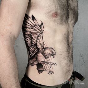 Tattoo Flying eagle on the ribs motif: animals style: graphic / illustrative