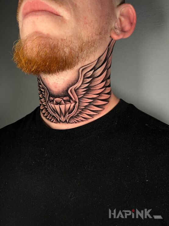 Tattoo Uskrzydlony diament in wings motif and graphic / illustrative style on the throat
