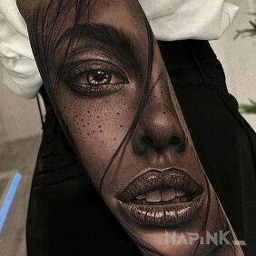 Tattoo Seductive lips On the arm motif: black and gray style: realistic