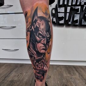 Tattoo Twice Batman on the calf motif: colorful style: realistic