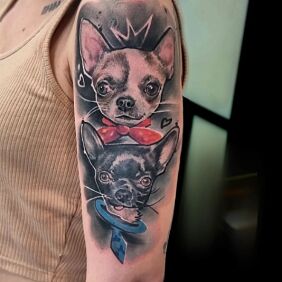 Tattoo Puppies portrait on the upper arm motif: colorful style: graphic / illustrative