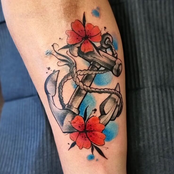 Tatuaż kotwica w motywie kolorowe i stylu neotradycyjne na łydce