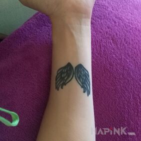 Tattoo Wings on the forearm motif: angels