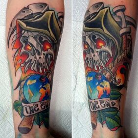 Tattoo The end on the forearm motif: lettering style: newschool