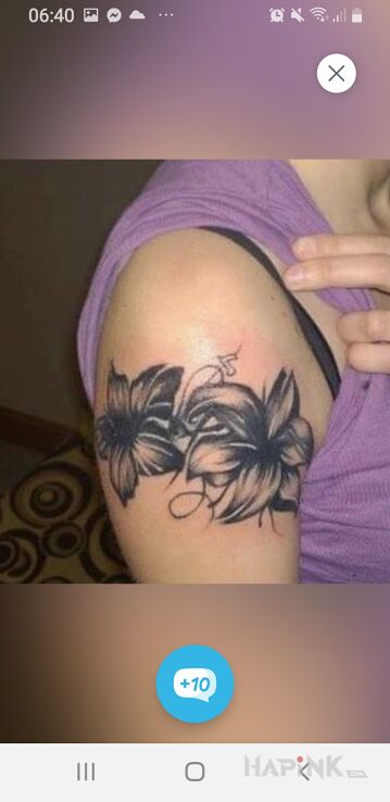 Tattoo Cover in black and gray motif and graphic / illustrative style on the upper arm