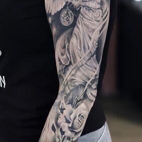 Tattoo Guardian angel sleeve on the upper arm motif: sleeves style: realistic
