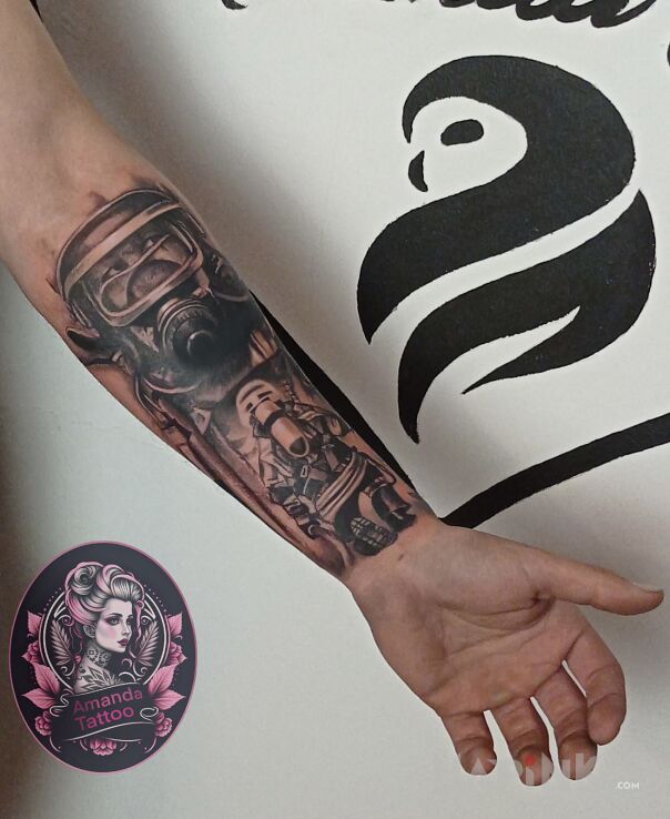 Tattoo Strażak in characters motif and realistic style on the forearm