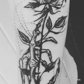Tattoo First tattoo on the forearm motif: black and gray style: graphic / illustrative
