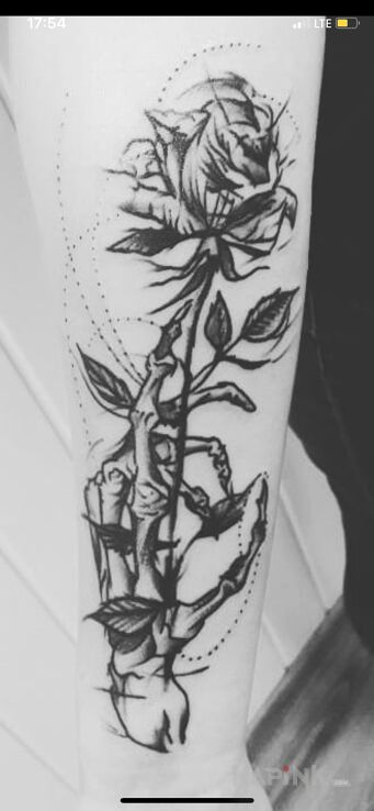 Tattoo Pierwszy tattoo in black and gray motif and graphic / illustrative style On the arm