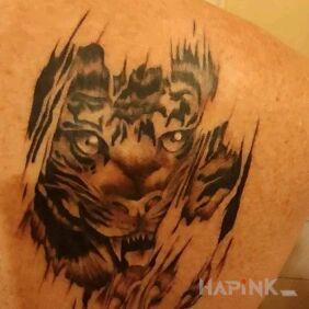 Tattoo Mine on the back motif: ripped skin style: realistic