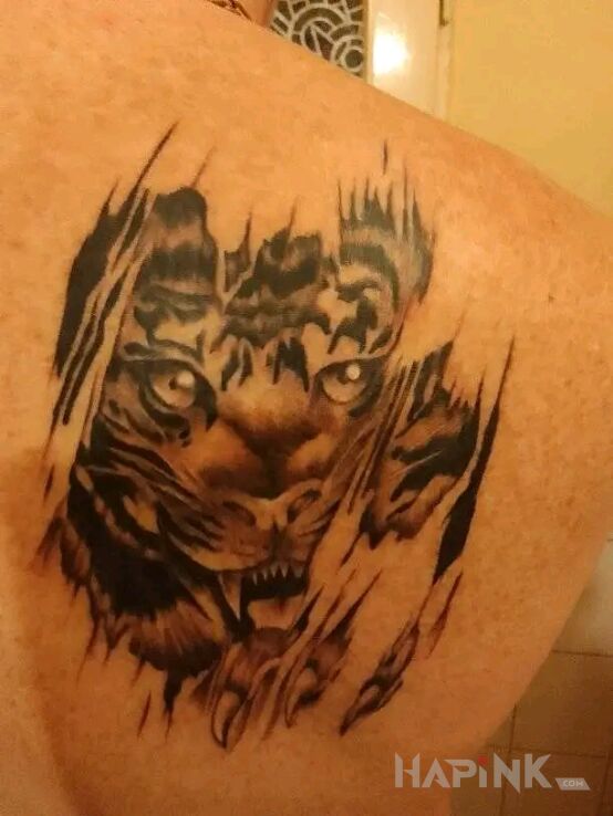 Tattoo Mój in animals motif and realistic style on the back
