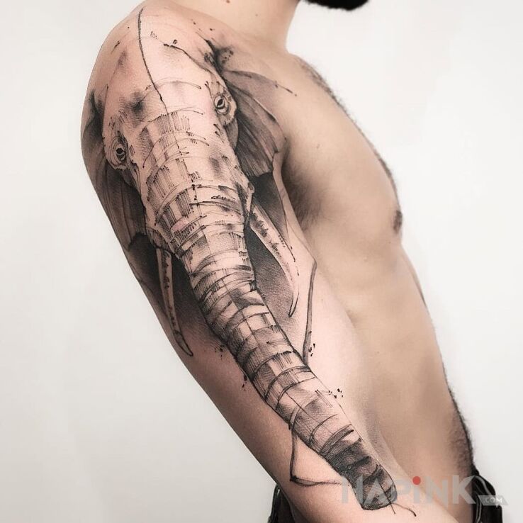 Tattoo Słoooooń in animals motif and realistic style on the upper arm