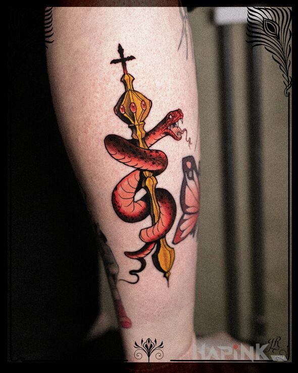 Tattoo True face of kingdom in objects motif and neo-traditional style on the calf