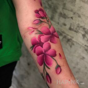 Tattoo Cherry Blossoms by Roofie! on the forearm motif: colorful style: Watercolor