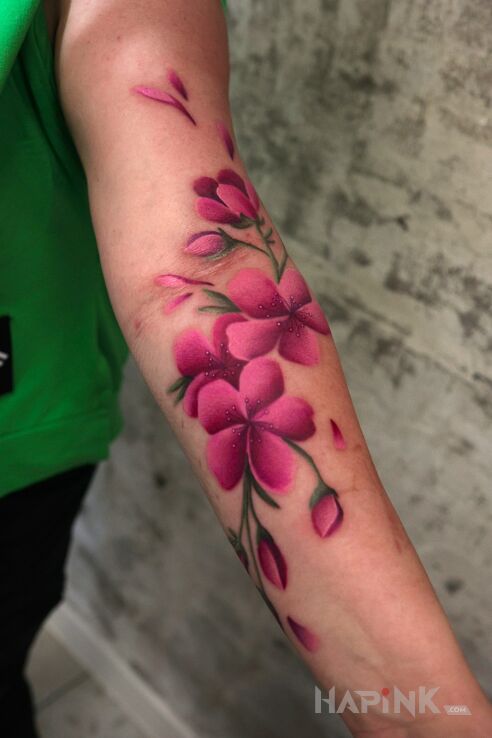Tattoo Kwiaty wiśni od Roofiego! in flowers motif and Watercolor style on the forearm