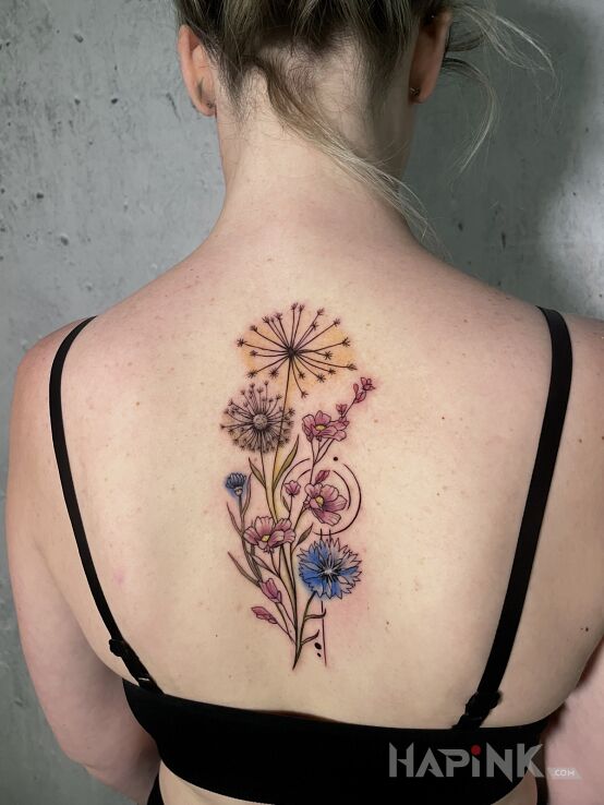 Tattoo Łąka na plecach! in colorful motif and graphic / illustrative style on the back
