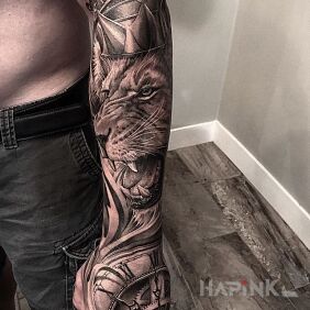 Tattoo Lion in the bark on the forearm motif: 3D style: realistic