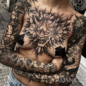 Tattoo Japanese mask in outline On the arm motif: animals style: graphic / illustrative