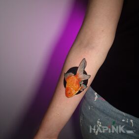 Tattoo Goldfish on the forearm motif: animals style: japanese / irezumi