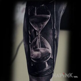 Tattoo Hourglass on the forearm motif: 3D style: realistic