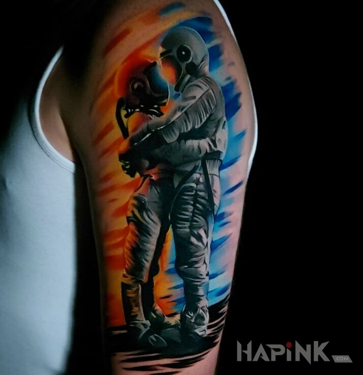 Tattoo Power of love in characters motif and Watercolor style on the upper arm