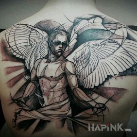 Tattoo The angel's features on the back motif: angels
