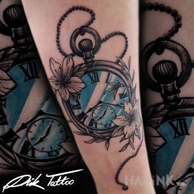 Tattoo Clock flowers color on the forearm motif: colorful style: graphic / illustrative