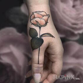 Tattoo Rose with pale pink on the hand motif: colorful style: neo-traditional