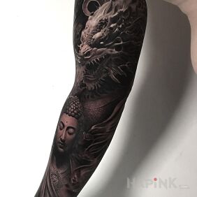 Tattoo Oriental dragon on the forearm motif: faces style: realistic