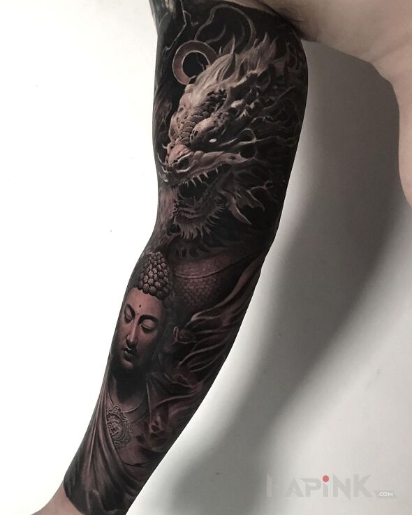 Tattoo Smok z orientu in religious motif and realistic style on the bicep