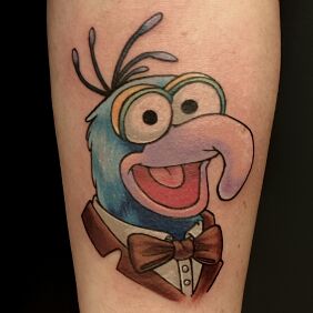 Tattoo Men's forearm tattoo of Gonzo from The Muppet Show On the arm motif: funny style: cartoon / comic book