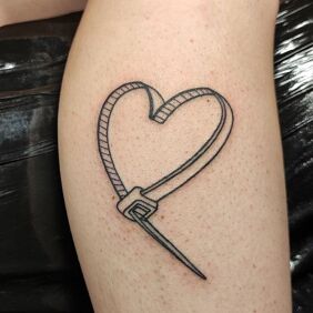 Tattoo Tattoo of a gearhead gearheadlove on the calf motif: other style: contour / linework
