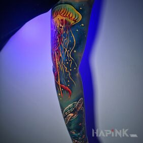 Tattoo Colorful sleeve in a marine theme on the bicep motif: animals style: realistic