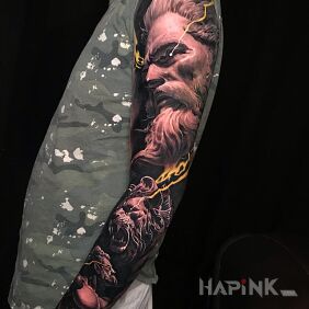 Tattoo Thunderous Zeus on the upper arm motif: black and gray style: realistic