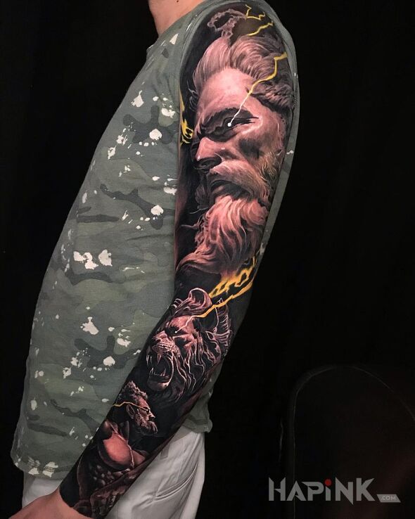 Tattoo Gromowładny Zeus in sleeves motif and realistic style on the upper arm