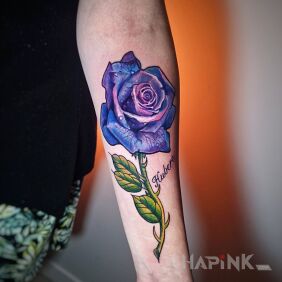 Tattoo Colorful rose on the forearm On the arm motif: colorful style: newschool