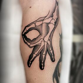 Tattoo MUKA on the calf motif: anatomical style: dotwork