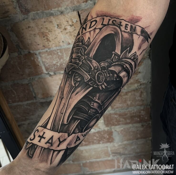 Tattoo Diablo Tyrael in dark motif and graphic / illustrative style on the forearm