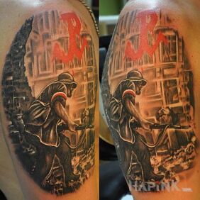 Tattoo Warsaw on the upper arm motif: characters