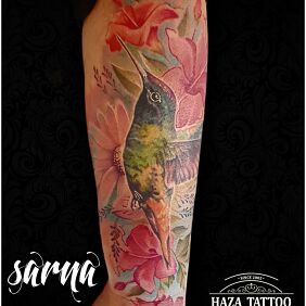 Tattoo Hummingbird flowers color On the arm motif: flowers style: realistic