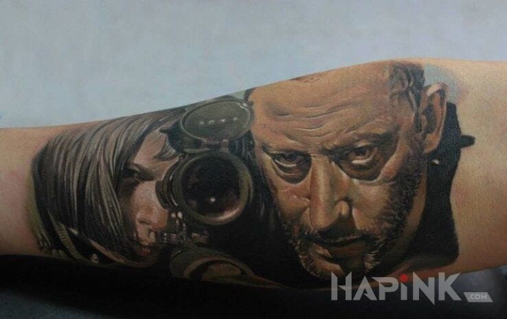 Tattoo Leon Zawodowiec in faces motif and realistic style on the forearm