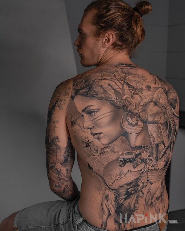 Tattoo Wypad na safari in faces motif and realistic style on the back