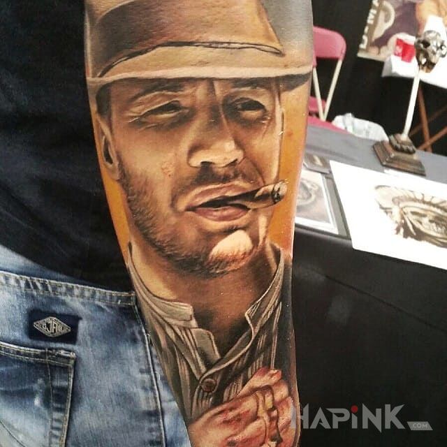 Tattoo Tom hardy in 3D motif and realistic style on the forearm