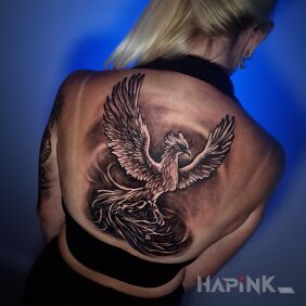 Tattoo Phoenix on the back on the back motif: animals style: realistic